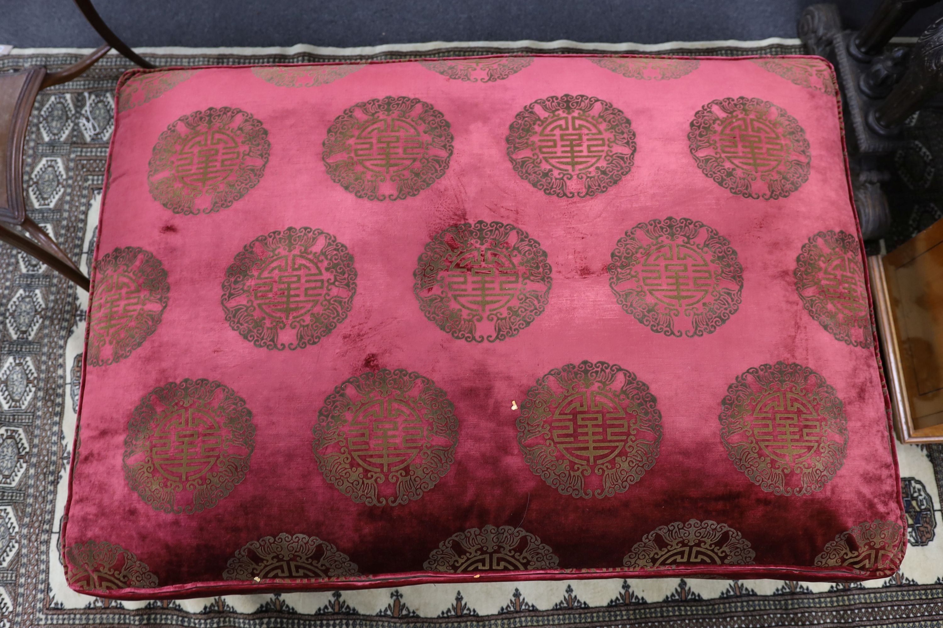 A large Duresta rectangular footstool upholstered in a Chinese style fabric, length 122cm, depth 84cm, height 40cm